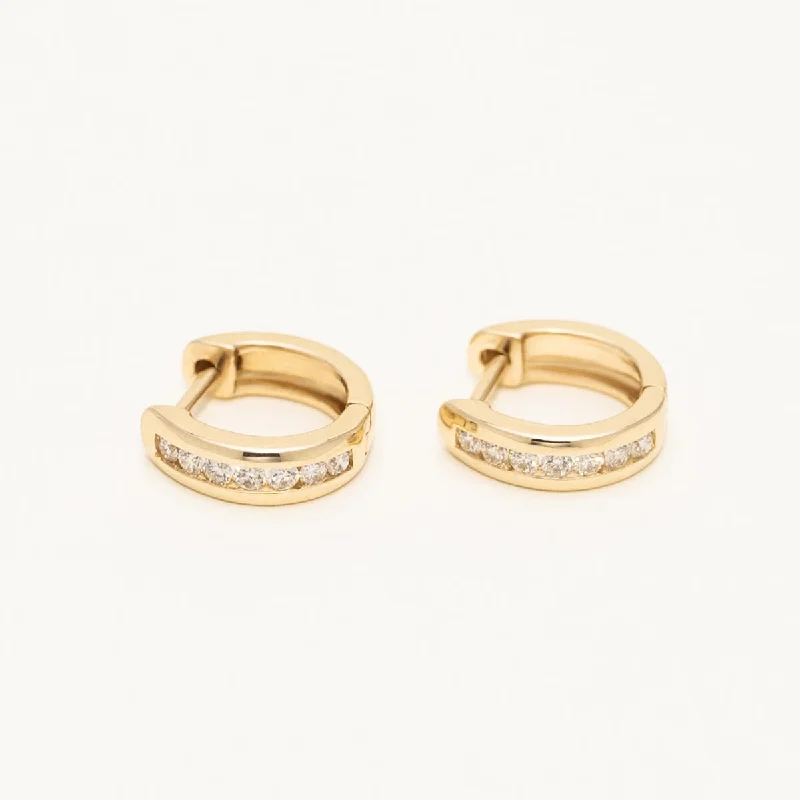 Diamond Huggie Hoop Earrings in 14kt Yellow Gold (1/4ct tw)